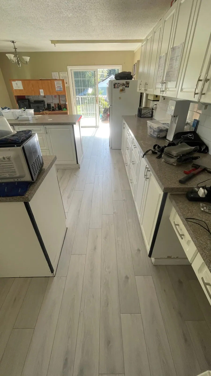 Hardwood Through the Kitchen — Becker Flooring, Okanagan Valley